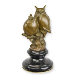 Sculpture en bronze de deux hiboux perchés sur une branche